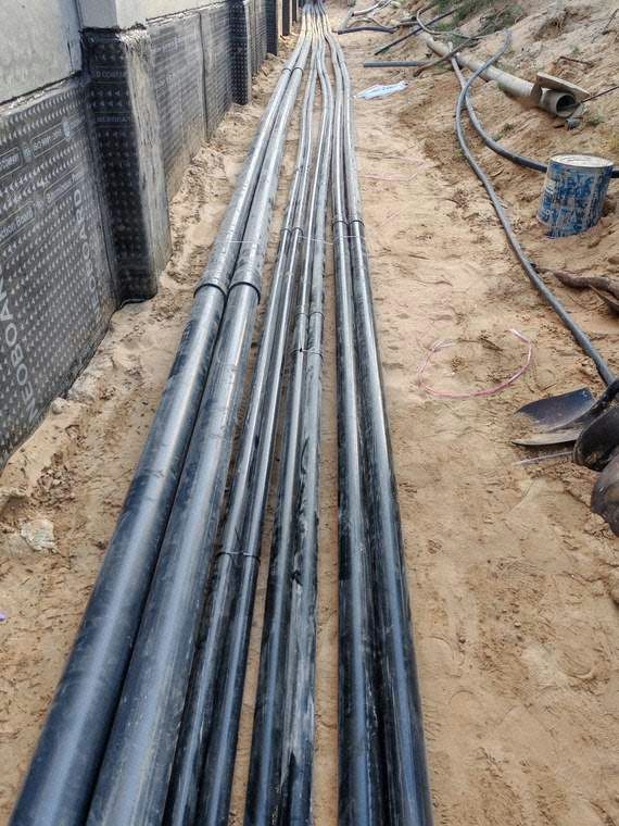 Installation of 75 mm and 50 mm sleeve pipes for CCTV, Etisalat, and
