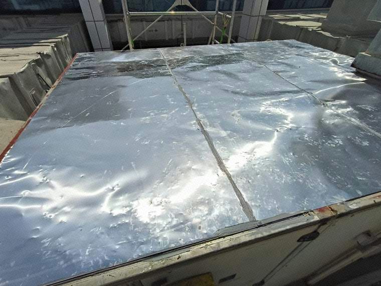 Application of Weatherproof Sealant to Roof Joints