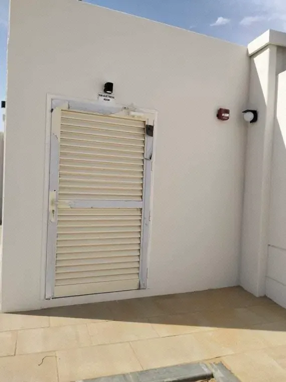 Fixing of external wall lights around electrical room