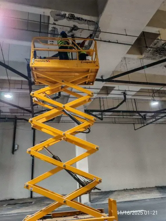 Defective areas identified and marked across the soffit
